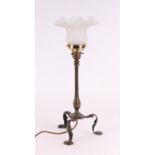 An Arts and Crafts brass Pullman lamp, 41cm high.
