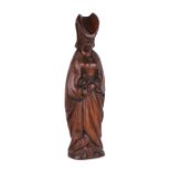A late 19th / early 20th century carved oak figure depicting a North European lady in late 15th