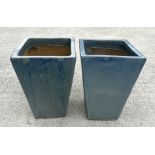 A pair of grey glazed planters of square tapering form, each 30cm wide (2).