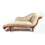 A Victorian walnut chaise longue, 180cm long. Condition ReportThe structure is sound, the feet and