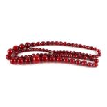 A graduated cherry amber bead necklace, 48g, approx 72cm long.Condition ReportAll of the beads
