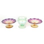 A pair of Art glass pedestal bonbon dishes with ground out pontil mark, 13cm diameter; together with