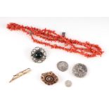 A coral necklace and other costume jewellery.