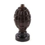 An inert mounted US Pineapple grenade. 13.5cms (5.25ins) high overall