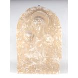 A plaster cast plaque depicting the Madonna and Child, 56cm wide.