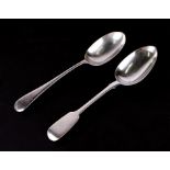 An early Victorian silver fiddle pattern tablespoon, London 1847, crested; and a late Victorian