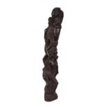 An African tribal carved ebony fertility group of intertwined figures, 42cm high.