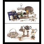 A quantity of silverplated items to include teapots, telescopic candlesticks, swing handled basket