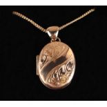 A 9ct gold locket on a 9ct gold chain. 9.9g