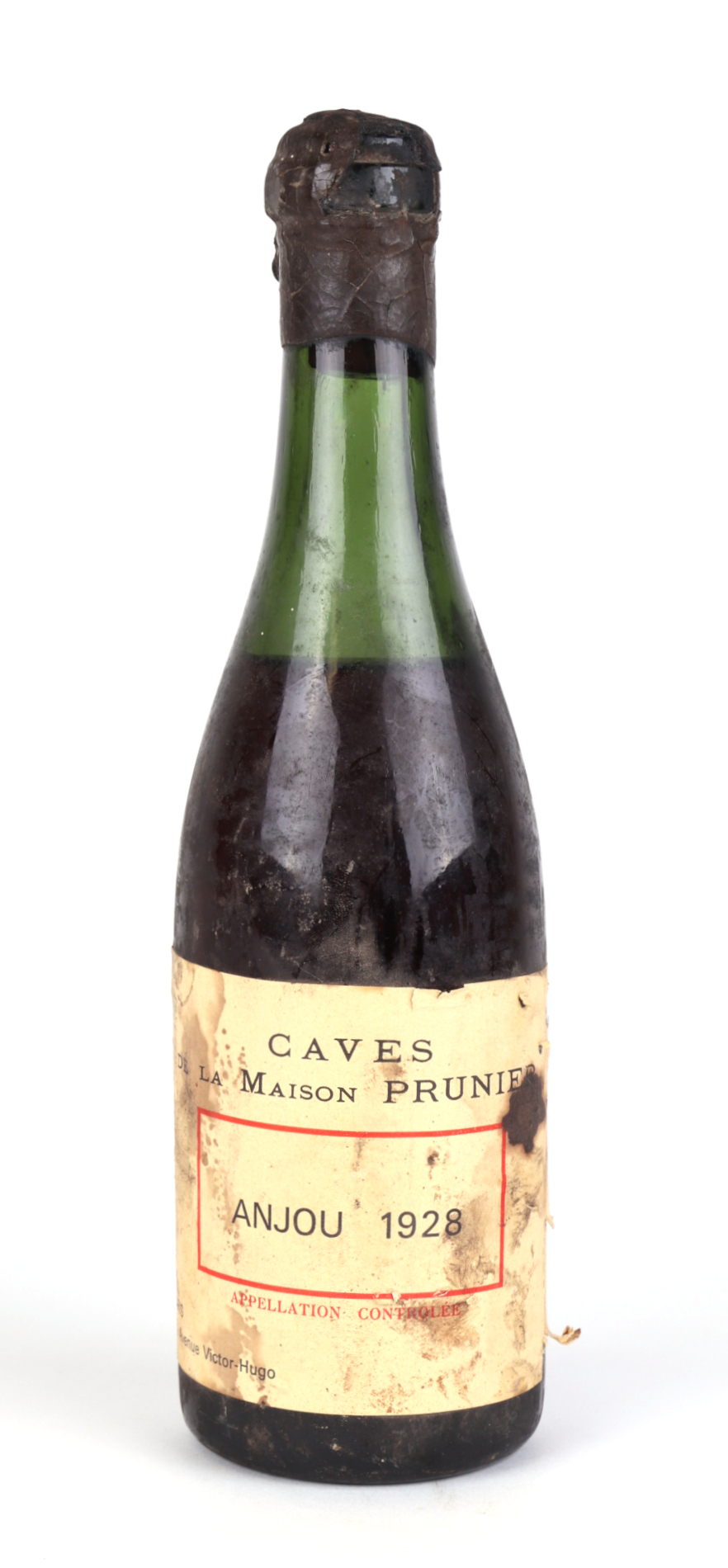 A half bottle of Caves de la Maison Prunier, Anjou 1928.