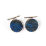 A pair of gentleman's lapis lazuli cufflinks set in silver coloured metal mounts.