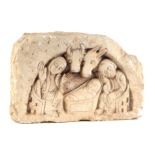 A carved stone nativity scene plaque depicting Mary, Joseph, and Baby Jesus in a manger, 26cm wide.