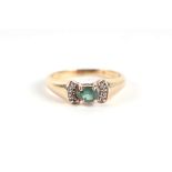 A 9ct gold green stone and diamond bow tie form dress ring, approx UK size 'N', 3g.
