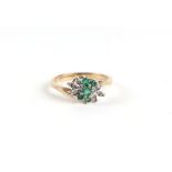 A 9ct gold green stone and diamond cluster ring, UK size J, 2g