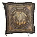 An Indian padded sequin and bullion wire wall hanging depicting an elephant, 58cm by 58cm.