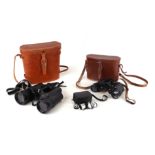 A pair of Pegasus no. 7783, 10x50 binoculars in carrying case; a pair of Aquilus 8x30 binoculars,