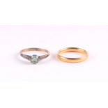 A 22ct gold wedding band, 3.8g; together with a pale green stone solitaire dress ring (2).