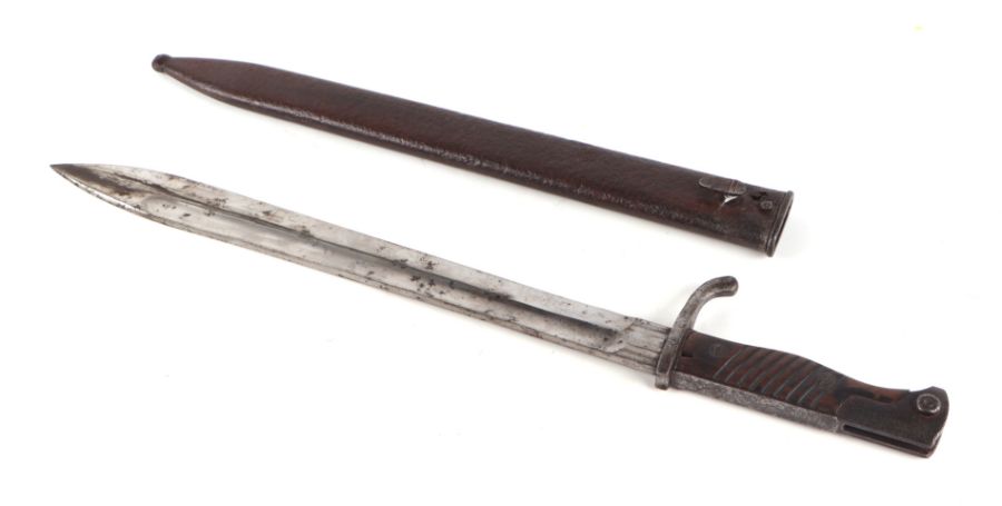 An M1898/05 Imperial German Butcher bayonet in its steel scabbard. Marked to the ricasso and near