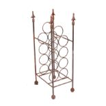 A wrought iron 9-bottle wine rack, 22cms wide.