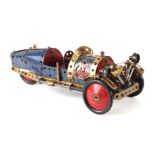 A Meccano Morgan three-wheel sports car constructed from pre 1941 blue and gold Meccano, 29cm long.