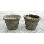 A pair of reconstituted stone circular planters, 34cms diameter (2).