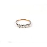 An 18ct gold and platinum five-stone diamond ring, approx UK size N, 2g. Condition Report There is