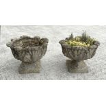 A pair of well weathered reconstituted stone urn planters, 48cm diameter (2)