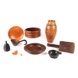 A collection of treen items to include an auctioneers cherry wood gavel; a honey pot; plates; vase