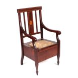 A late 19th century mahogany commode chair, having a back splat with oak leaf inlaid decoration,