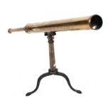 A 19th century lacquered brass astronomical telescope on stand with three inch refracting lens,