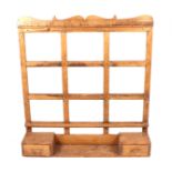 A rustic pine wall rack with two short drawers and nine cup hooks, 102cms wide. Condition Report