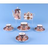 A Royal Crown Derby old Imari pattern chocolate pot and cover, three coffee cans and saucers, a