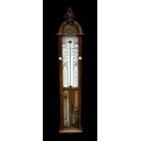 A Victorian Admiral Fitzroy barometer in an oak case. 112cm high Condition Report Looks to be in