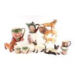A quantity of assorted ceramics including a Beswick lion family comprising lion, lioness and cub;