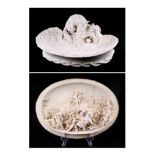 A Parian ware figural dish depicting a fox and rabbit, 29cm wide; and a similar plaque depicting the