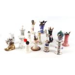 A collection of vintage ceramic hat pin holders.