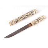 A late 19th century carved bone Japanese Tanto dagger with 17.5cms (6.875ins) blade.