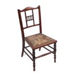 A late Victorian / Edwardian child's stained beach chair with inlaid decoration and turned front