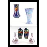 A pair of S Hancock & Sons Titian ware vases, 24cm high; a pair of Wilton ware luster vases