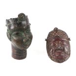 An African Benin style cast bronze bust depicting a male head wearing a crown, approximately 20cm