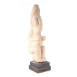 A pre-Columbian votive stone figure of a shaman, on a later stand,41cms high. Condition Report Old