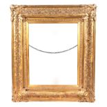 A large 19th century gilt wood and gesso picture frame, overall 83cm by 96cm (to hold painting