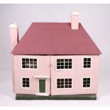 An early to mid 20th century doll's house; together with some doll's house furniture, 91cms wide.