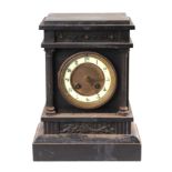 A Victorian black slate mantle clock, the white enamel dial with Arabic numerals, the movement