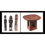 An African carved hardwood fertility figure, 40cm high; two others similar and an Ashanti style