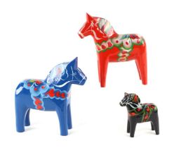 A group of Swedish hand painted Dalla horses. Largest 13cms high (3).