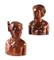 A pair of Burmese carved hardwood busts, 31cms high (2).