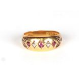 An 18ct ruby and diamond gypsy ring, approx UK size L, 3.4g.