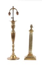 A brass Corinthian column table lamp, 38cms high; together with a twin-arm brass table lamp, 66cms