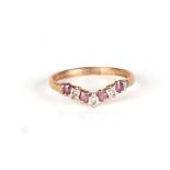 A 9ct gold ruby and diamond wishbone ring, approx UK size K, 1.2g.